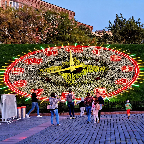Monumental hillside floral clock landmark facing a major public promenade Monumental hillside floral clock landmark facing a major public promenade